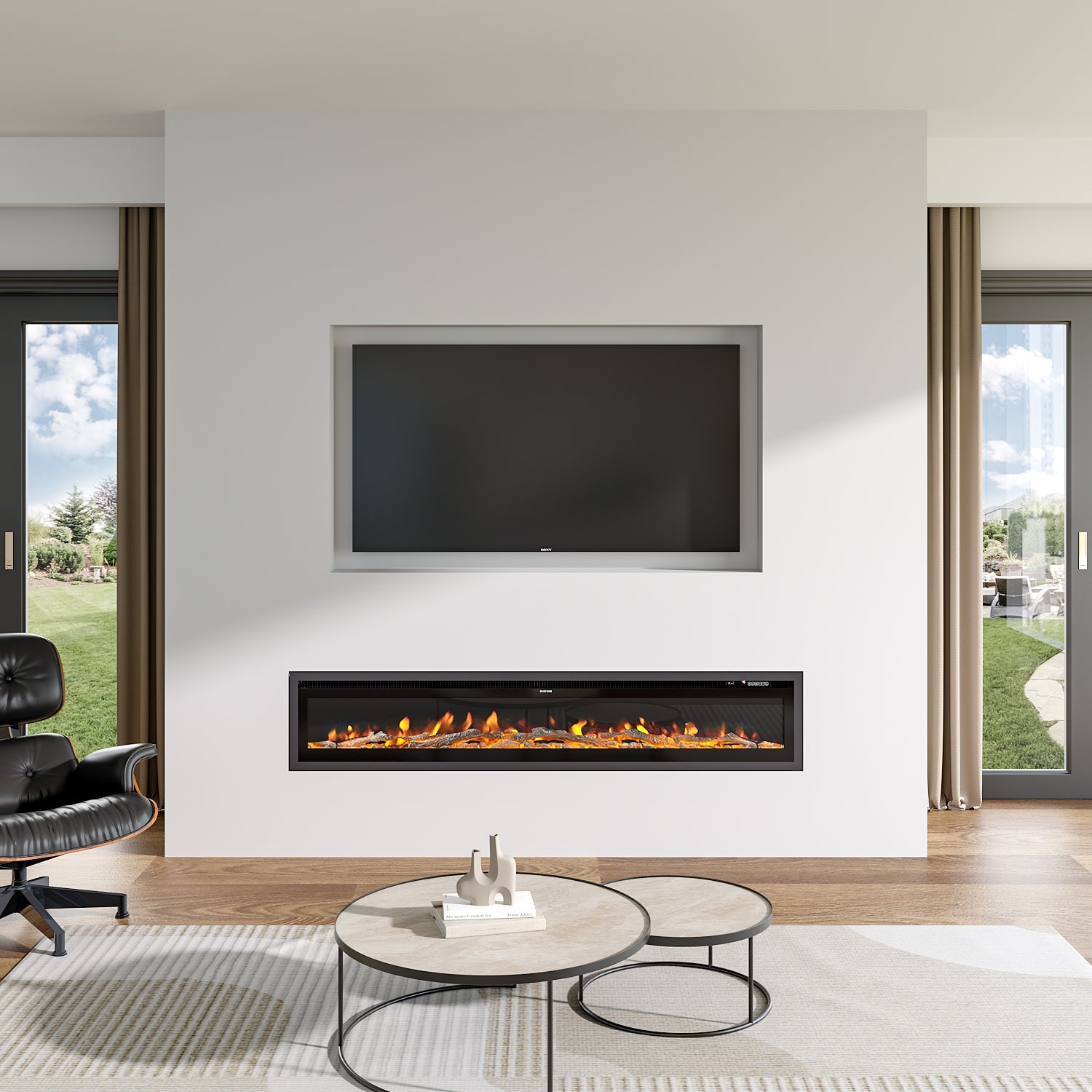Recessed electric fireplace with glowing orange flames, seamlessly integrated into a minimalist white wall below a built-in TV, paired with a modern round coffee table and natural light from large windows.